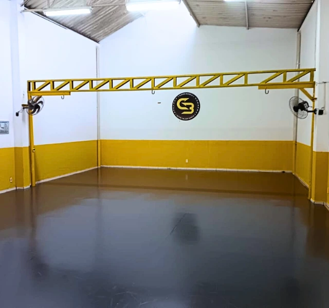 Tatame e área de treino da Academia Claudio Bueno